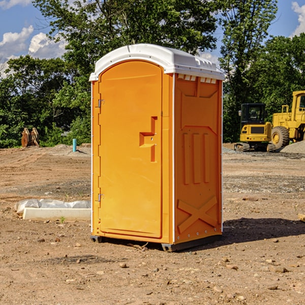 how often are the portable restrooms cleaned and serviced during a rental period in Tower